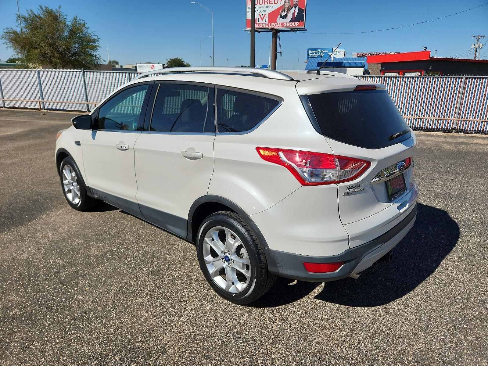 2014 WHITE Ford Escape Titanium (1FMCU0J93EU) with an ENGINE: 2.0L ECOBOOST engine, located at 4110 Avenue Q, Lubbock, 79412, 33.556553, -101.855820 - 10/12/2023 KEY AND INSPECTION IN ENVELOPE GOD - Photo #2