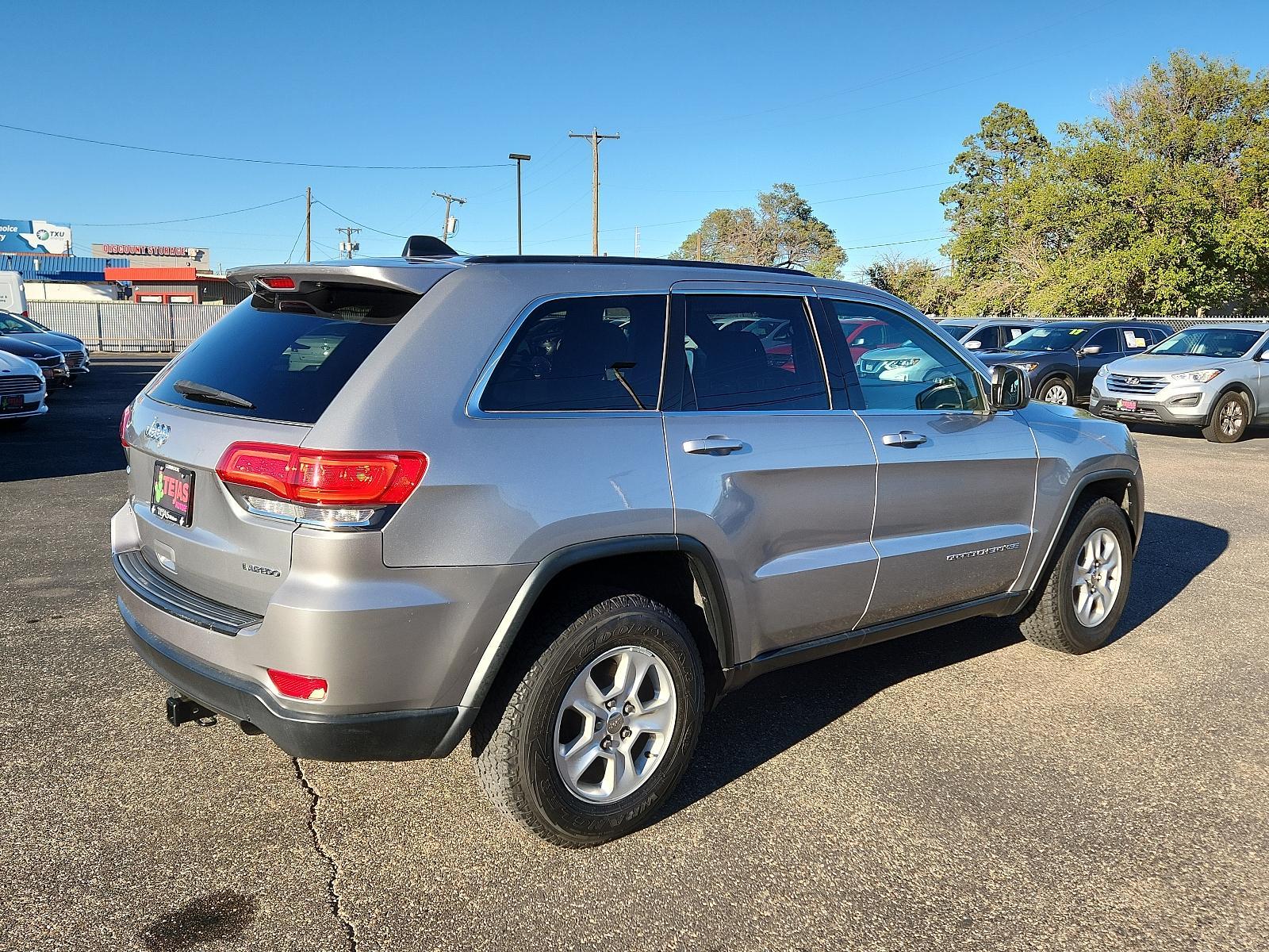 2016 SIVLER Jeep Grand Cherokee Laredo (1C4RJFAGXGC) with an ENGINE: 3.6L V6 24V VVT UPG I W/ESS engine, located at 4110 Avenue Q, Lubbock, 79412, 33.556553, -101.855820 - 10/21/2023 INSPECTION AND KEY IN ENVELOPE GOD - Photo #1