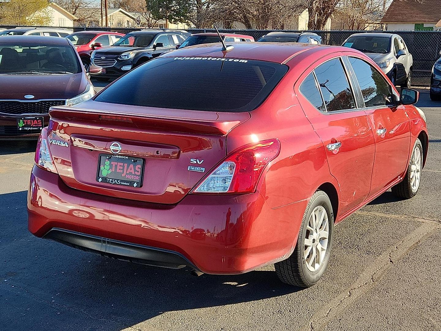 2018 Cayenne Red - NAH /Charcoal - G Nissan Versa 1.6 SV (3N1CN7AP8JL) with an 1.6L I-4 DOHC, variable valve control, regular unleaded, engine with 109HP engine, located at 4110 Avenue Q, Lubbock, 79412, 33.556553, -101.855820 - Photo#1