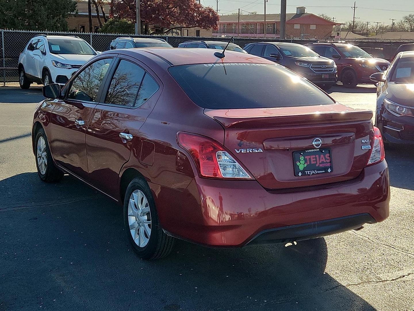 2018 Cayenne Red - NAH /Charcoal - G Nissan Versa 1.6 SV (3N1CN7AP8JL) with an 1.6L I-4 DOHC, variable valve control, regular unleaded, engine with 109HP engine, located at 4110 Avenue Q, Lubbock, 79412, 33.556553, -101.855820 - Photo#2