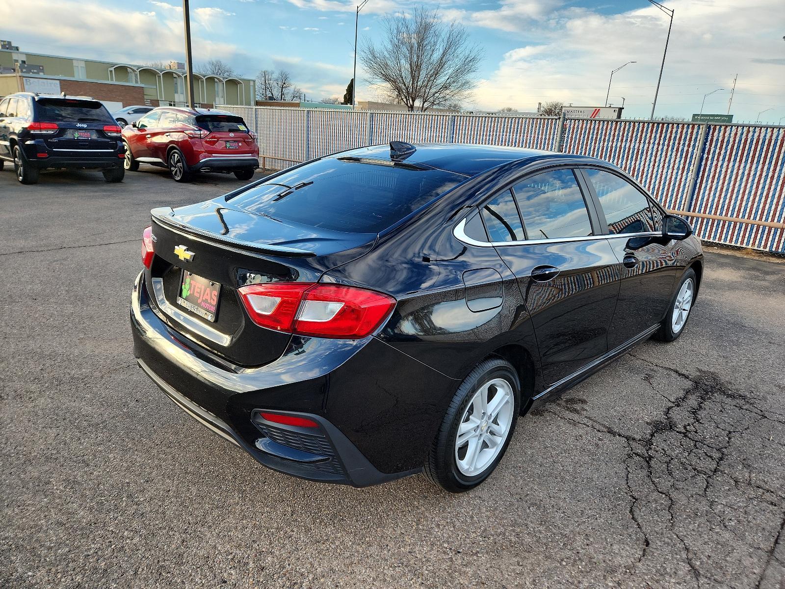 2018 BLACK Chevrolet Cruze LT (1G1BE5SM8J7) with an ENGINE, 1.4L TURBO DOHC 4-CYLINDER DI engine, located at 4110 Avenue Q, Lubbock, 79412, 33.556553, -101.855820 - 01/23/2024 INSPECTION IN ENVELOPE GOD 01/30/2024 KEY IN ENVELOPE GOD - Photo #1