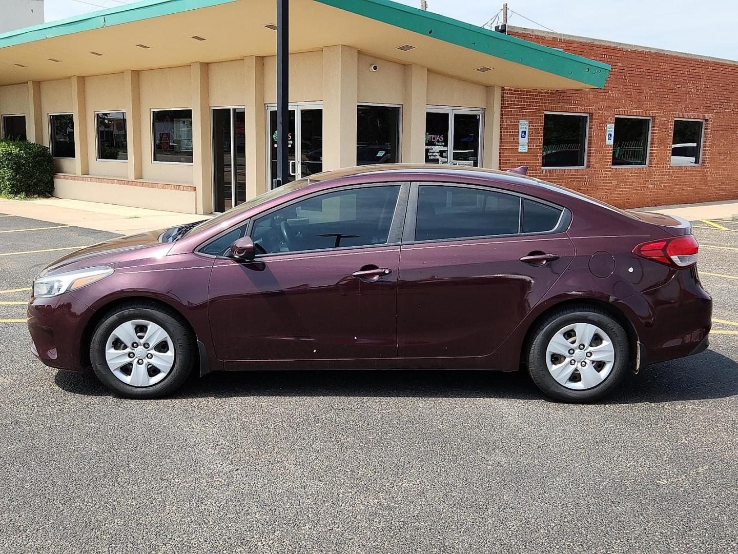 2017 Garnet Red - B4N /Black - WK Kia Forte LX (3KPFK4A74HE) with an 2L I-4 DOHC, D-CVVT variable valve control, regular unleaded, engine with 147HP engine, located at 4110 Avenue Q, Lubbock, 79412, 33.556553, -101.855820 - Photo#3