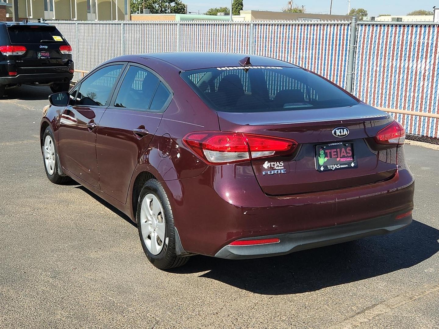 2017 Garnet Red - B4N /Black - WK Kia Forte LX (3KPFK4A74HE) with an 2L I-4 DOHC, D-CVVT variable valve control, regular unleaded, engine with 147HP engine, located at 4110 Avenue Q, Lubbock, 79412, 33.556553, -101.855820 - Photo#2