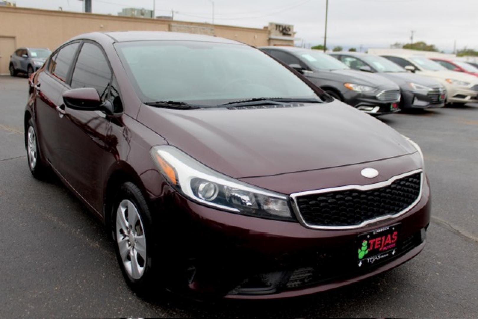 2017 Garnet Red - B4N /Black - WK Kia Forte LX (3KPFK4A74HE) with an 2L I-4 DOHC, D-CVVT variable valve control, regular unleaded, engine with 147HP engine, located at 4110 Avenue Q, Lubbock, 79412, 33.556553, -101.855820 - 11/12/2025 KEY IN ENVELOPE GOD- Photo#0