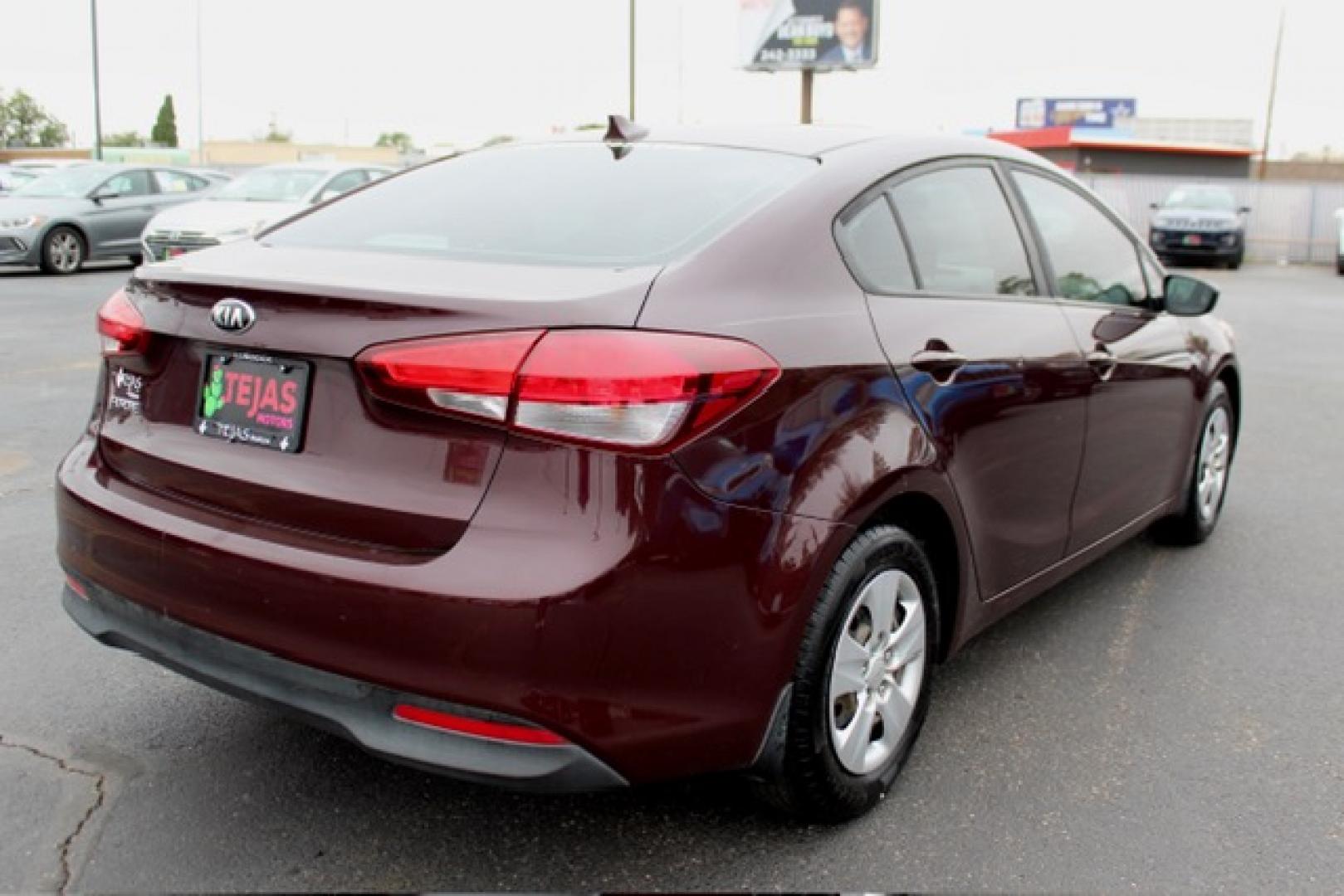 2017 Garnet Red - B4N /Black - WK Kia Forte LX (3KPFK4A74HE) with an 2L I-4 DOHC, D-CVVT variable valve control, regular unleaded, engine with 147HP engine, located at 4110 Avenue Q, Lubbock, 79412, 33.556553, -101.855820 - 11/12/2025 KEY IN ENVELOPE GOD- Photo#2