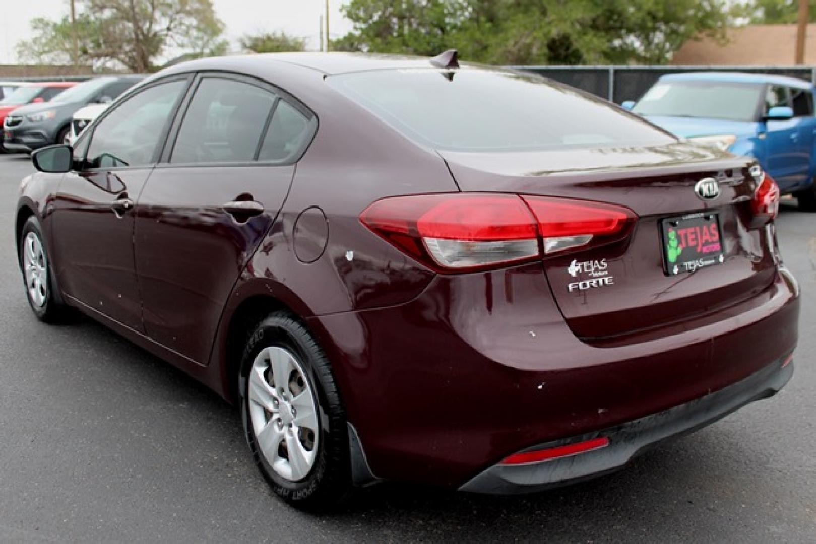 2017 Garnet Red - B4N /Black - WK Kia Forte LX (3KPFK4A74HE) with an 2L I-4 DOHC, D-CVVT variable valve control, regular unleaded, engine with 147HP engine, located at 4110 Avenue Q, Lubbock, 79412, 33.556553, -101.855820 - 11/12/2025 KEY IN ENVELOPE GOD- Photo#3