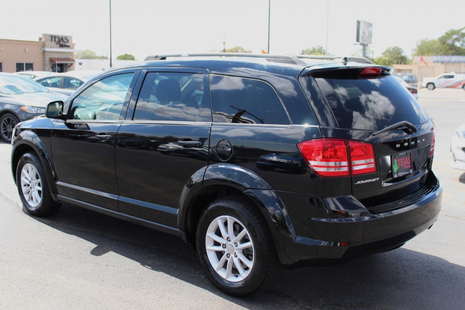 2018 Pitch Black Clearcoat - PX8 /Black - E5X9 Dodge Journey SE (3C4PDCAB9JT) with an ENGINE: 2.4L I4 DOHC 16V DUAL VVT engine, located at 4110 Avenue Q, Lubbock, 79412, 33.556553, -101.855820 - 12/04/2024 KEY AND INSPECTION IN ENVELOPE GOD- Photo#1