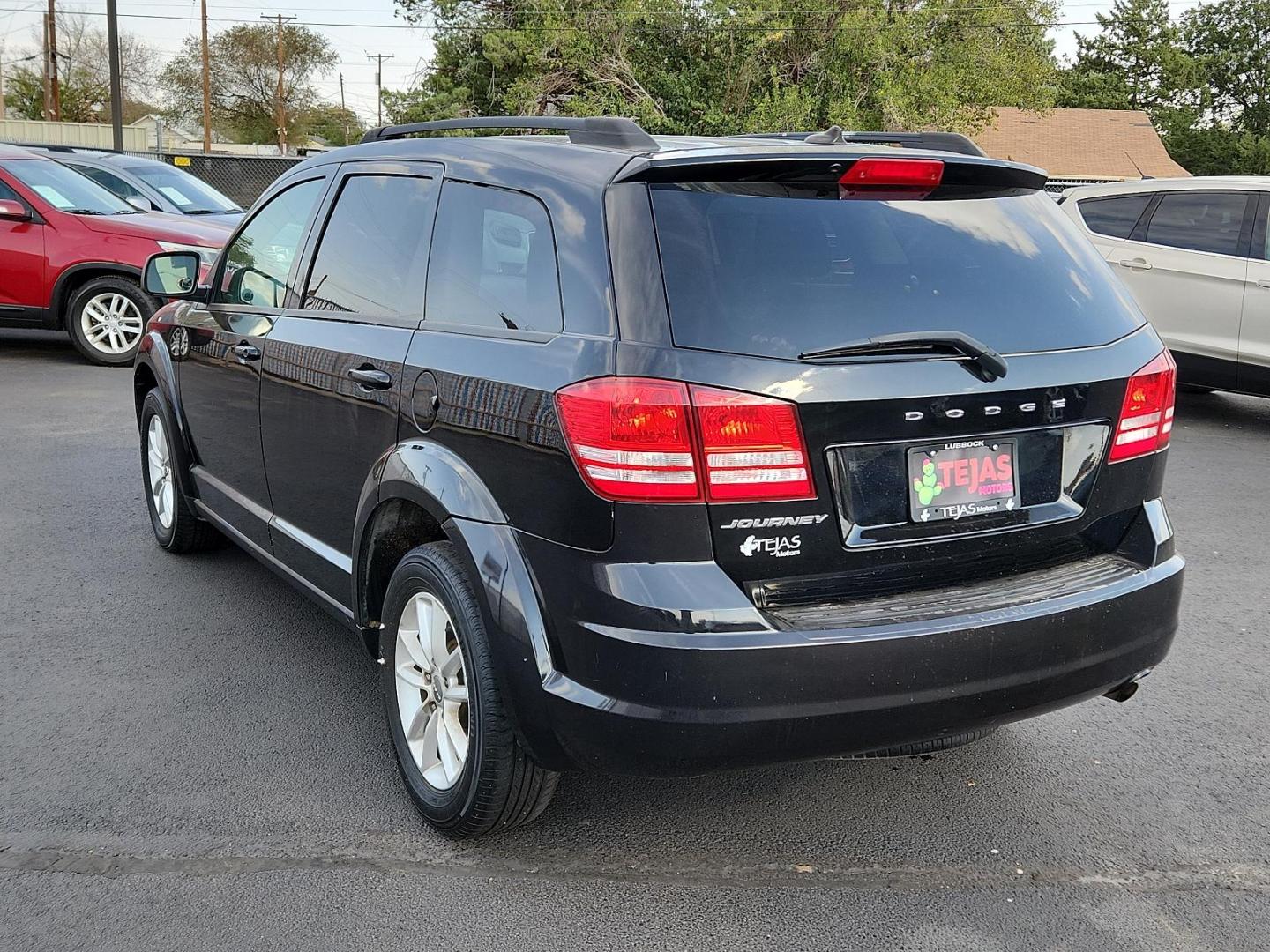 2018 Pitch Black Clearcoat - PX8 /Black - E5X9 Dodge Journey SE (3C4PDCAB9JT) with an ENGINE: 2.4L I4 DOHC 16V DUAL VVT engine, located at 4110 Avenue Q, Lubbock, 79412, 33.556553, -101.855820 - 12/04/2024 KEY AND INSPECTION IN ENVELOPE GOD - Photo#2