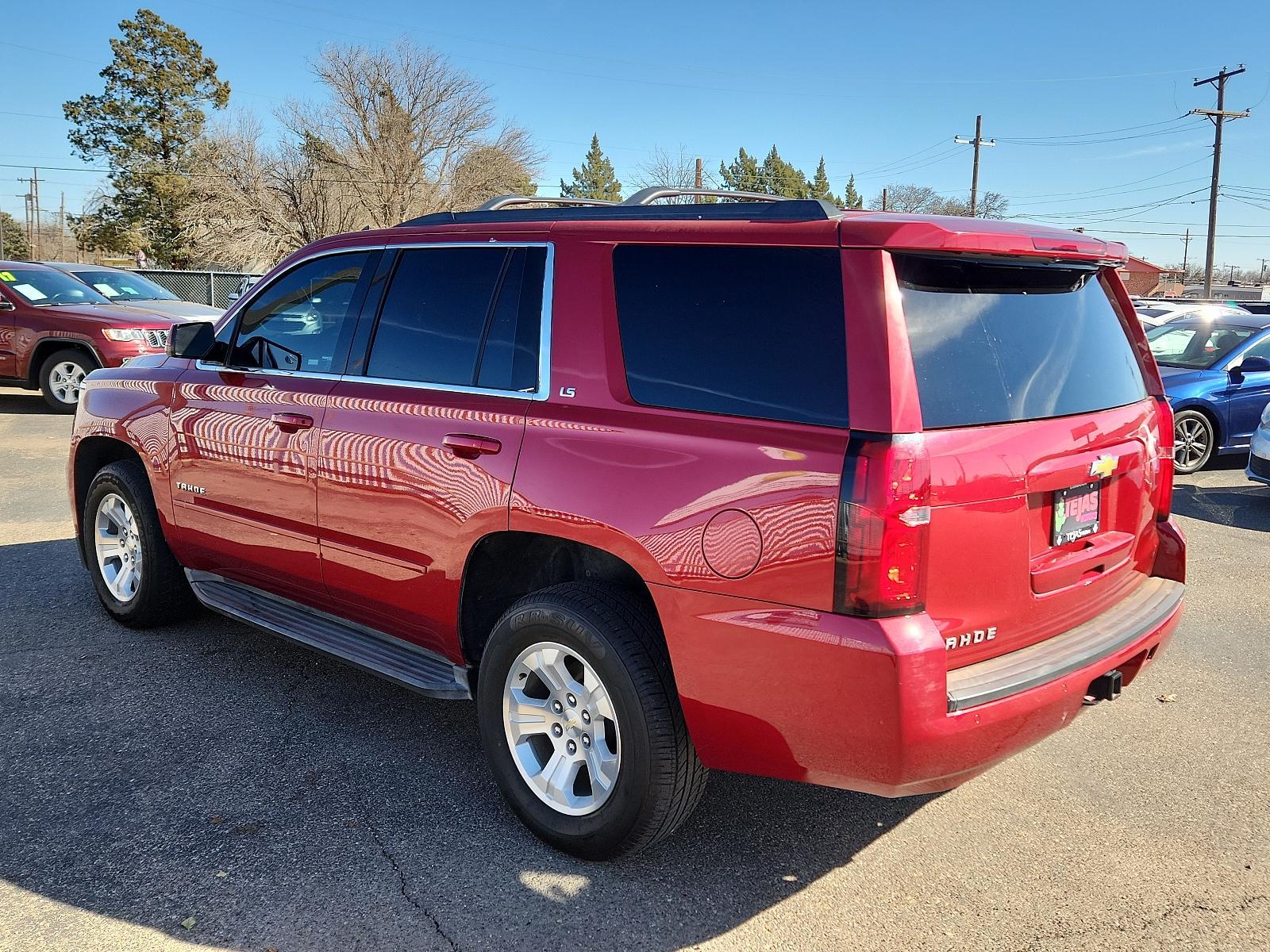 2015 Crystal Red Tintcoat - GBE /Jet Black - H0U Chevrolet Tahoe LS (1GNSCAKC1FR) with an ENGINE, 5.3L ECOTEC3 V8 WITH ACTIVE FUEL MANAGEMENT, DIRECT INJECTION AND VARIABLE VALVE TIMING engine, located at 4110 Avenue Q, Lubbock, 79412, 33.556553, -101.855820 - 02/03/2024 KEY IN ENVELOPE GOD - Photo #2