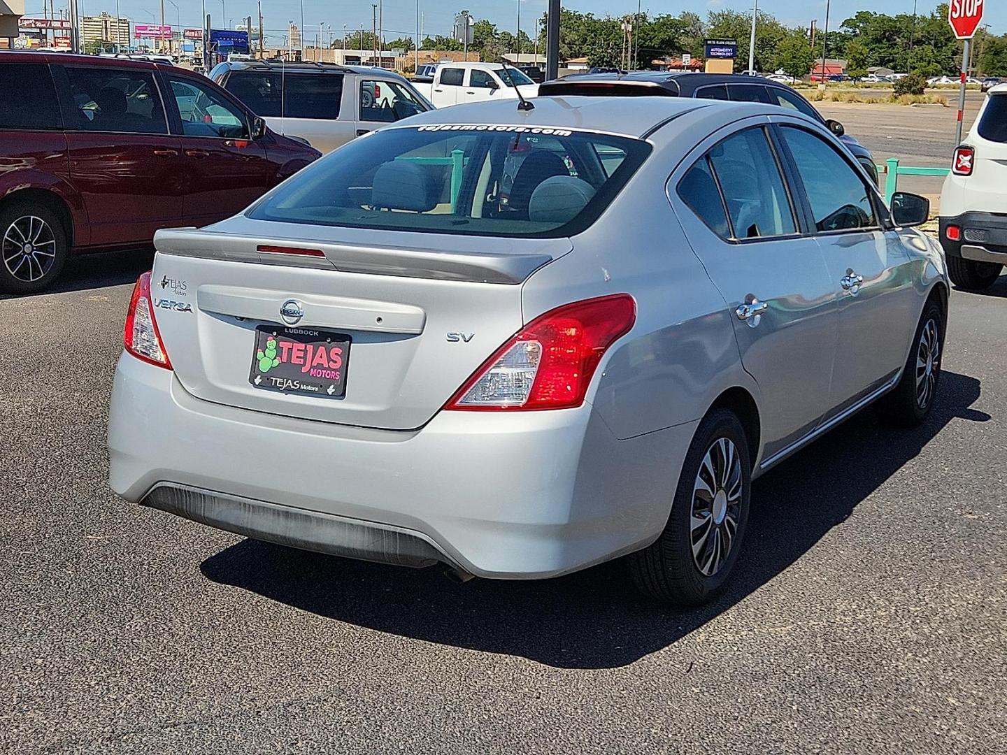 2019 Brilliant Silver Metallic - K23 /Charcoal - G Nissan Versa 1.6 SV (3N1CN7AP6KL) with an 1.6L I-4 DOHC, variable valve control, regular unleaded, engine with 109HP engine, located at 4110 Avenue Q, Lubbock, 79412, 33.556553, -101.855820 - Photo#1