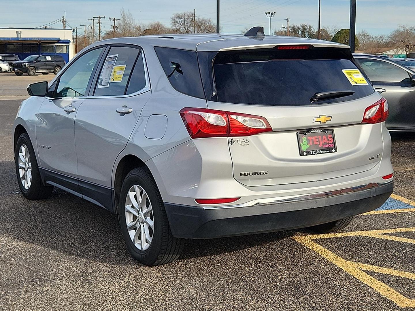 2019 SILVER /Black Chevrolet Equinox LT (2GNAXUEV5K6) with an 1.5L I-4 gasoline direct injection, DOHC, VVT variable valve control, intercooled turbo, regular unleaded, engine with 170HP engine, located at 4110 Avenue Q, Lubbock, 79412, 33.556553, -101.855820 - 02/17/2026 KEY IN ENVELOPE GOD - Photo#2