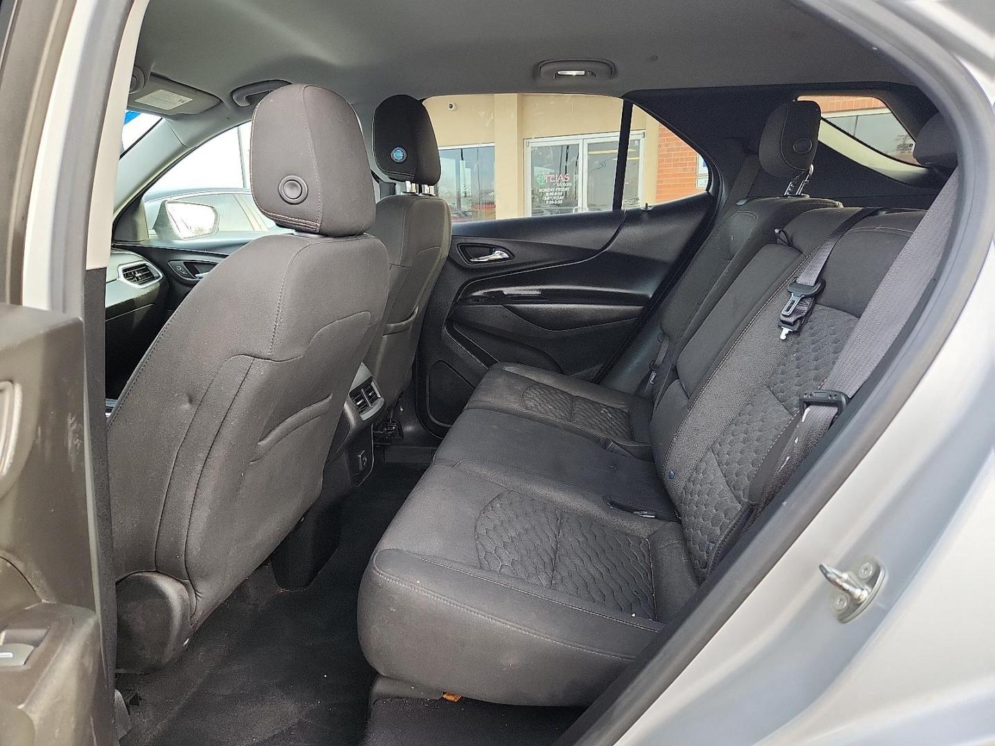 2019 SILVER /Black Chevrolet Equinox LT (2GNAXUEV5K6) with an 1.5L I-4 gasoline direct injection, DOHC, VVT variable valve control, intercooled turbo, regular unleaded, engine with 170HP engine, located at 4110 Avenue Q, Lubbock, 79412, 33.556553, -101.855820 - 02/17/2026 KEY IN ENVELOPE GOD - Photo#5