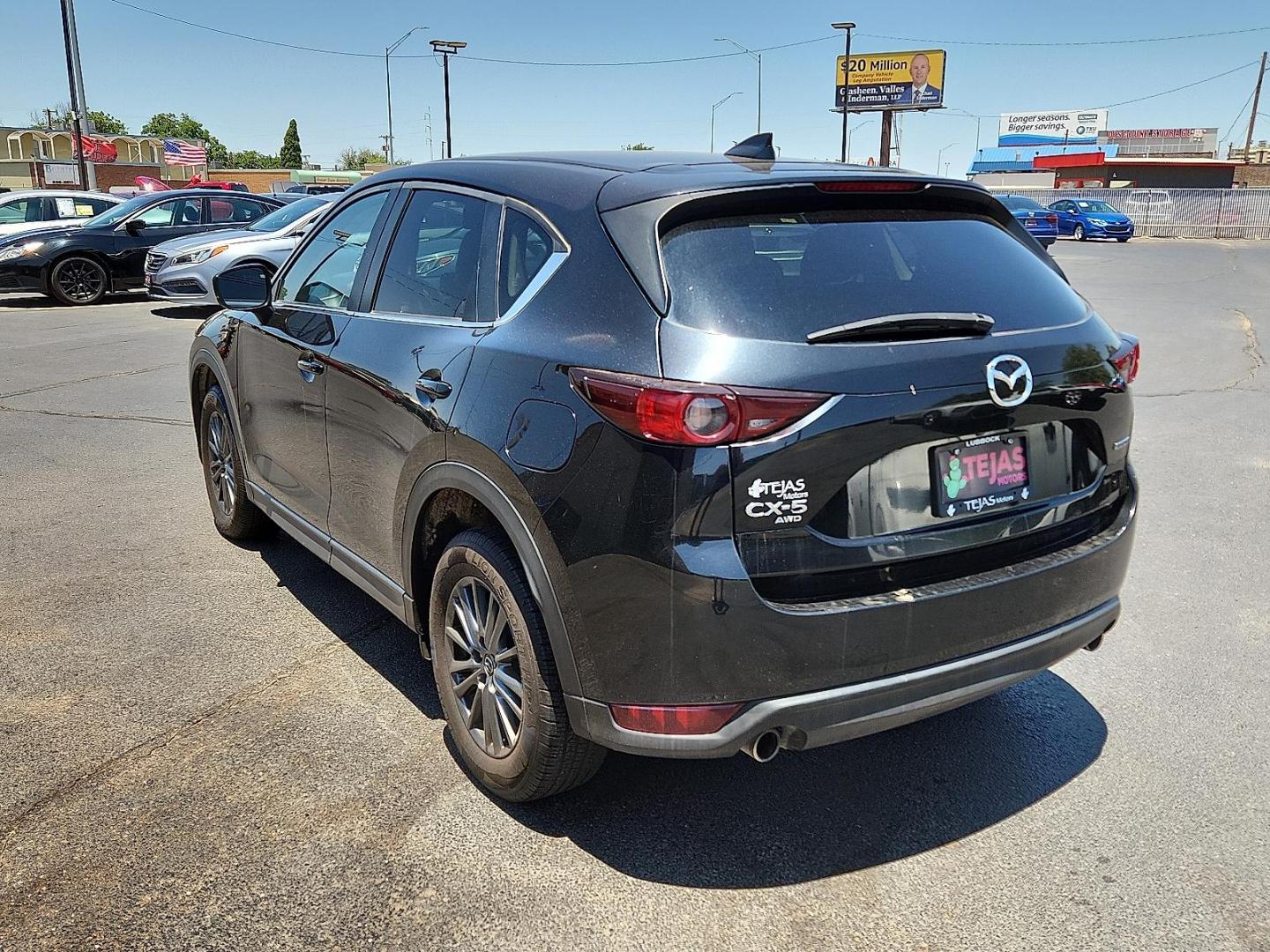 2020 BLACK Mazda CX-5 Touring (JM3KFBCM6L0) with an SKYACTIV-G 2.5L I-4 gasoline direct injection, DOHC, VVT variable valve control, regular unleaded, engine with cylinder deactivation and 187HP engine, located at 4110 Avenue Q, Lubbock, 79412, 33.556553, -101.855820 - Photo#2