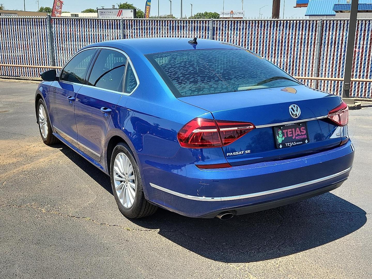 2017 Blue Volkswagen Passat 1.8T SE (1VWBT7A32HC) with an 1.8L I-4 gasoline direct injection, DOHC, variable valve control, intercooled turbo, regular unleaded, engine with 170HP engine, located at 4110 Avenue Q, Lubbock, 79412, 33.556553, -101.855820 - Photo#2