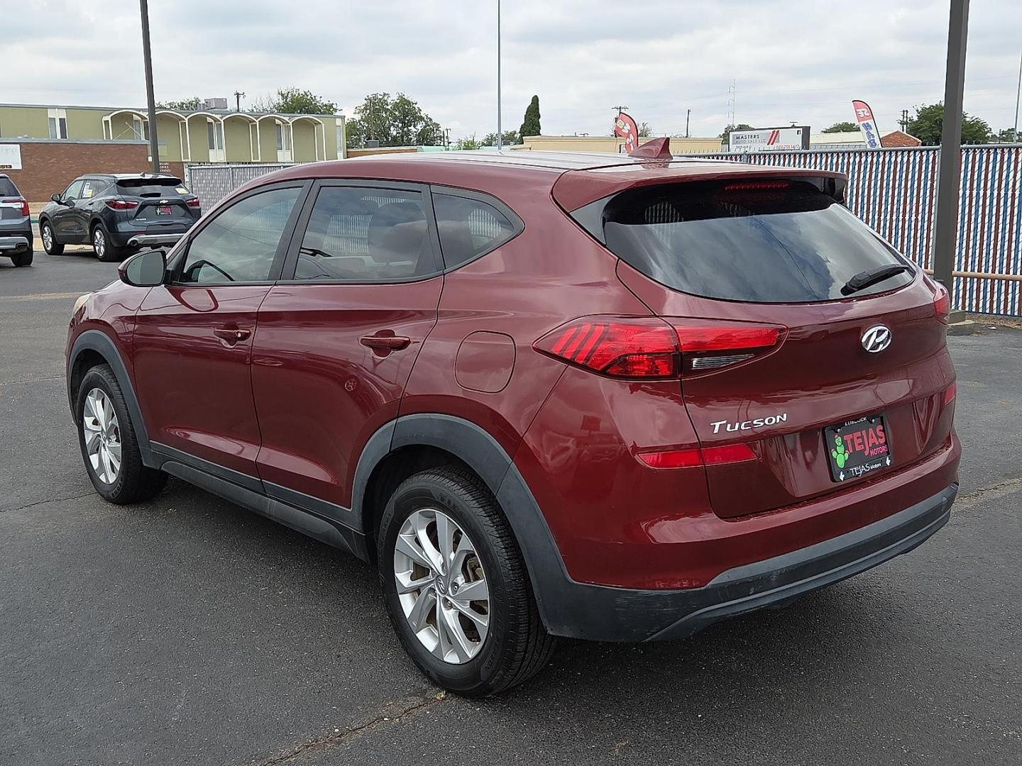 2019 Gemstone Red - R5R /Black - TRY Hyundai Tucson SE (KM8J23A40KU) with an Nu 2L I-4 gasoline direct injection, DOHC, D-CVVT variable valve control, regular unleaded, engine with 161HP engine, located at 4110 Avenue Q, Lubbock, 79412, 33.556553, -101.855820 - Photo#3