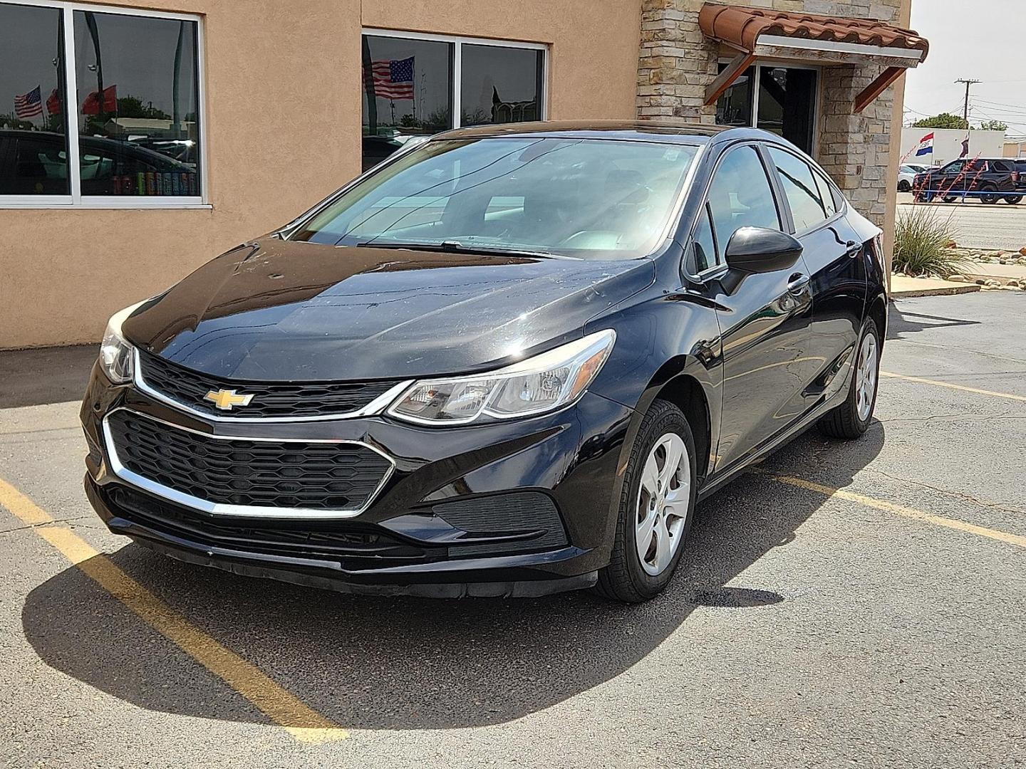 2016 Mosaic Black Metallic - GB8 /Jet Black - HLF Chevrolet Cruze LS Auto (1G1BC5SM2G7) with an 1.4L I-4 gasoline direct injection, DOHC, variable valve control, intercooled turbo, regular unleaded, engine with 153HP engine, located at 4110 Avenue Q, Lubbock, 79412, 33.556553, -101.855820 - Photo#1
