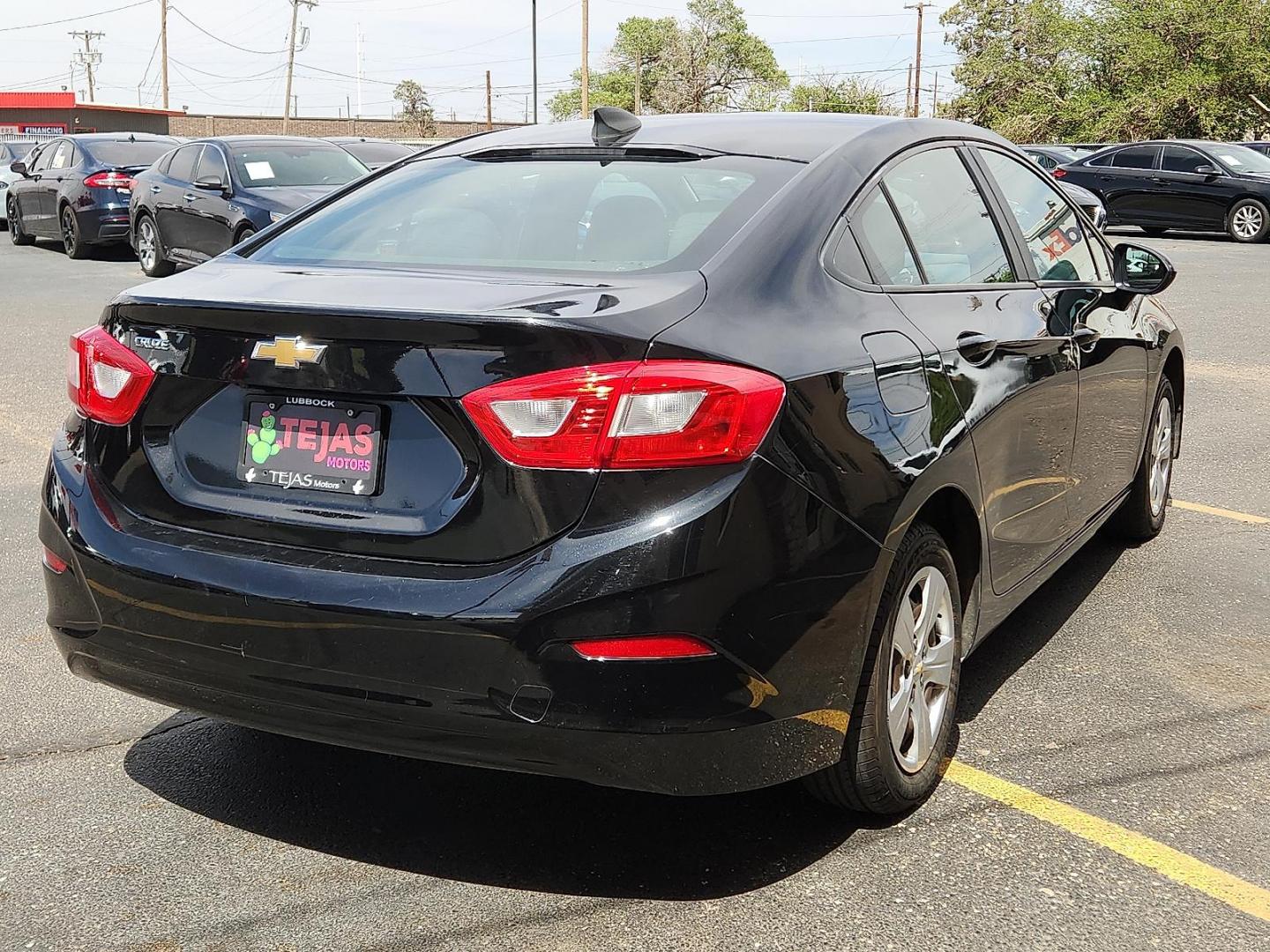 2016 Mosaic Black Metallic - GB8 /Jet Black - HLF Chevrolet Cruze LS Auto (1G1BC5SM2G7) with an 1.4L I-4 gasoline direct injection, DOHC, variable valve control, intercooled turbo, regular unleaded, engine with 153HP engine, located at 4110 Avenue Q, Lubbock, 79412, 33.556553, -101.855820 - Photo#3