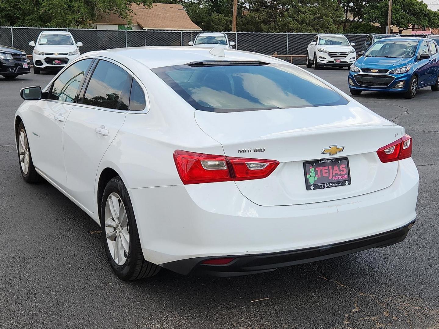 2018 WHITE Chevrolet Malibu LT (1G1ZD5ST0JF) with an ECOTEC 1.5L I-4 gasoline direct injection, DOHC, VVT variable valve control, intercooled turbo, regular unleaded, engine with 160HP engine, located at 4110 Avenue Q, Lubbock, 79412, 33.556553, -101.855820 - 05/13/2025 KEY IN ENVELOPE GOD - Photo#2