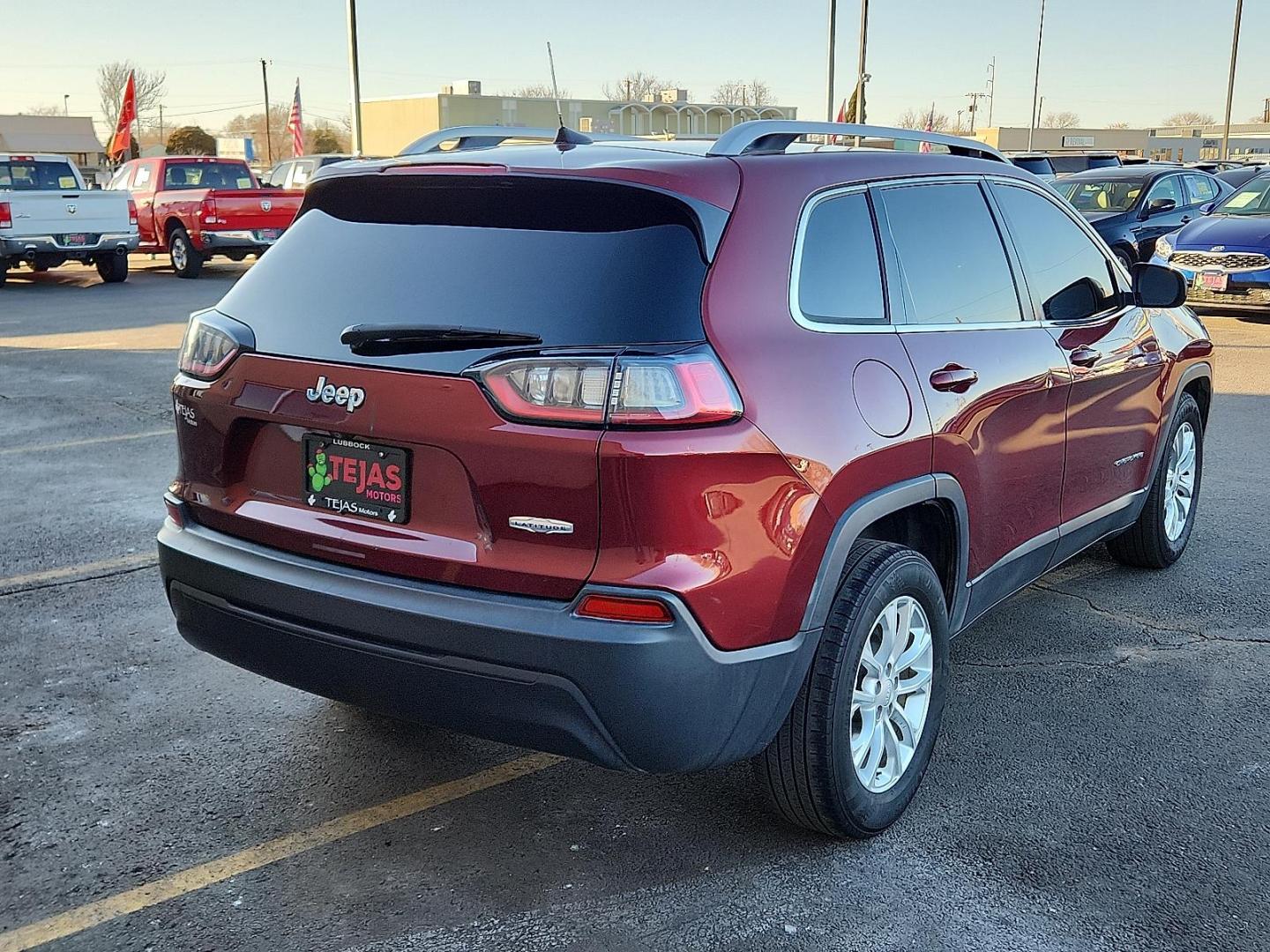 2019 RED Jeep Cherokee Latitude FWD (1C4PJLCB7KD) with an MultiAir2 Tigershark 2.4L I-4 variable valve control, regular unleaded, engine with 180HP engine, located at 4110 Avenue Q, Lubbock, 79412, 33.556553, -101.855820 - Photo#1
