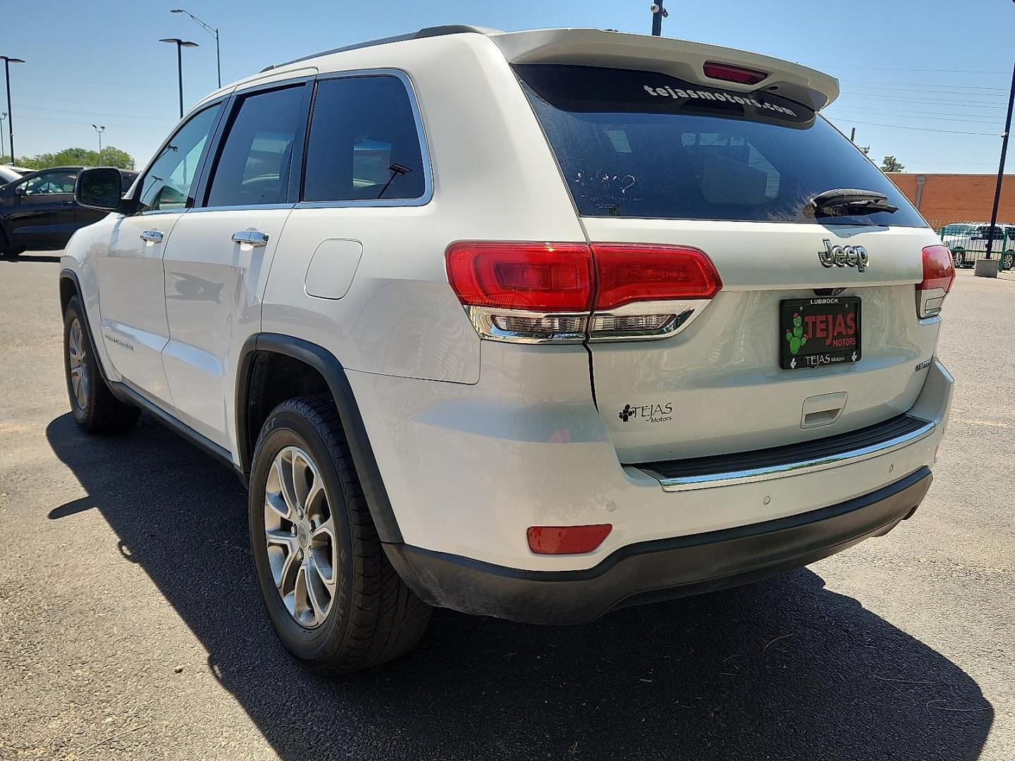2015 Bright White Clearcoat - PW7 /Black - X9 Jeep Grand Cherokee Limited (1C4RJEBG4FC) with an 3.6L V-6 DOHC, variable valve control, regular unleaded, engine with 290HP engine, located at 4110 Avenue Q, Lubbock, 79412, 33.556553, -101.855820 - Photo#2