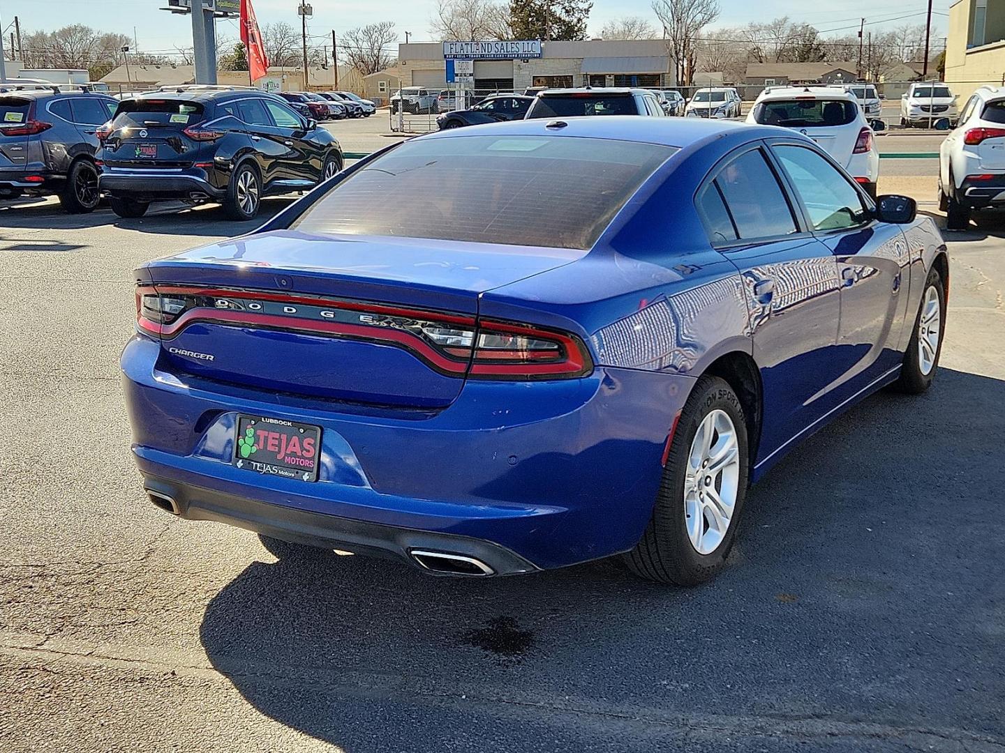 2019 Indigo Blue - PBM /Black - X9 Dodge Charger SXT RWD (2C3CDXBG8KH) with an Pentastar 3.6L V-6 DOHC, variable valve control, regular unleaded, engine with 292HP engine, located at 4110 Avenue Q, Lubbock, 79412, 33.556553, -101.855820 - Photo#1