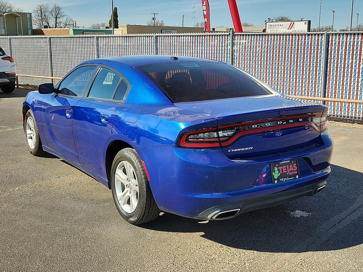 2019 Indigo Blue - PBM /Black - X9 Dodge Charger SXT RWD (2C3CDXBG8KH) with an Pentastar 3.6L V-6 DOHC, variable valve control, regular unleaded, engine with 292HP engine, located at 4110 Avenue Q, Lubbock, 79412, 33.556553, -101.855820 - Photo#2