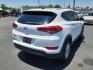 2016 Winter White Hyundai Tucson SE (KM8J33A40GU) with an Nu 2L I-4 gasoline direct injection, DOHC, variable valve control, regular unleaded, engine with 164HP engine, located at 4110 Avenue Q, Lubbock, 79412, 33.556553, -101.855820 - 02/05/2025 KEY IN ENVELOPE GOD - Photo#2