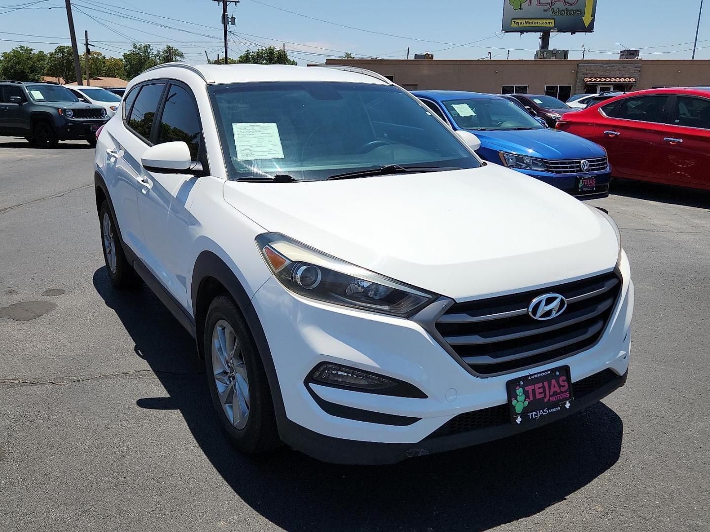 2016 Winter White Hyundai Tucson SE (KM8J33A40GU) with an Nu 2L I-4 gasoline direct injection, DOHC, variable valve control, regular unleaded, engine with 164HP engine, located at 4110 Avenue Q, Lubbock, 79412, 33.556553, -101.855820 - 02/05/2025 KEY IN ENVELOPE GOD - Photo#3