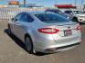 2016 Ingot Silver - UX /Charcoal Black - CW Ford Fusion Titanium (3FA6P0K93GR) with an EcoBoost 2L I-4 gasoline direct injection, DOHC, variable valve control, intercooled turbo, regular unleaded, engine with 231HP engine, located at 4110 Avenue Q, Lubbock, 79412, 33.556553, -101.855820 - Photo#2