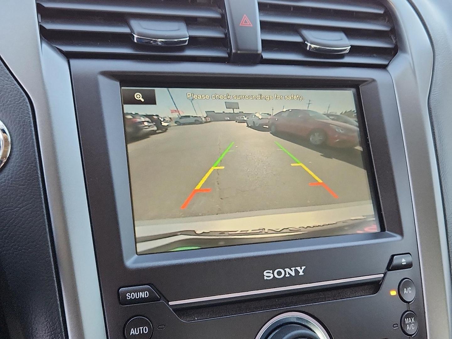 2016 Ingot Silver - UX /Charcoal Black - CW Ford Fusion Titanium (3FA6P0K93GR) with an EcoBoost 2L I-4 gasoline direct injection, DOHC, variable valve control, intercooled turbo, regular unleaded, engine with 231HP engine, located at 4110 Avenue Q, Lubbock, 79412, 33.556553, -101.855820 - Photo#7