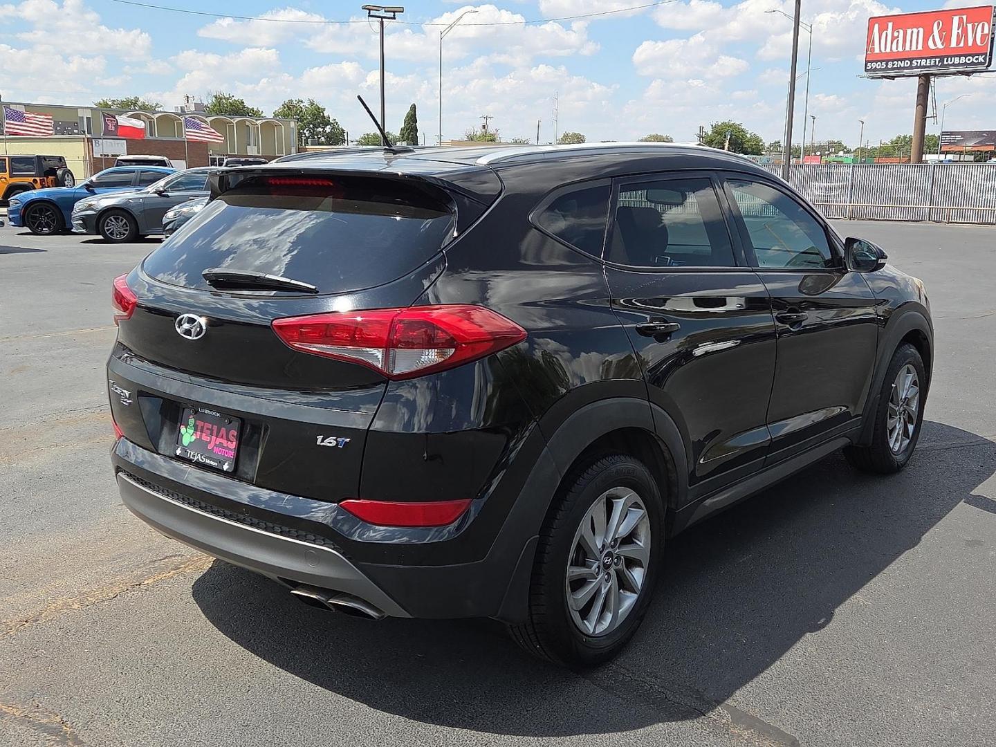 2016 Ash Black - TCM /Gray - TGG Hyundai Tucson Eco (KM8J33A25GU) with an 1.6L I-4 gasoline direct injection, DOHC, variable valve control, intercooled turbo, regular unleaded, engine with 175HP engine, located at 4110 Avenue Q, Lubbock, 79412, 33.556553, -101.855820 - Photo#2