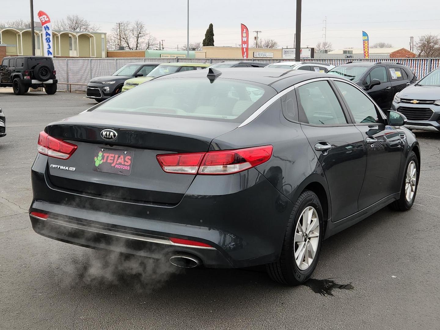 2016 GRAY Kia Optima LX (5XXGT4L3XGG) with an Theta II 2.4L I-4 gasoline direct injection, DOHC, CVVT variable valve control, regular unleaded, engine with 185HP engine, located at 4110 Avenue Q, Lubbock, 79412, 33.556553, -101.855820 - 02/13/2025 KEY IN ENVELOPE GOD - Photo#1