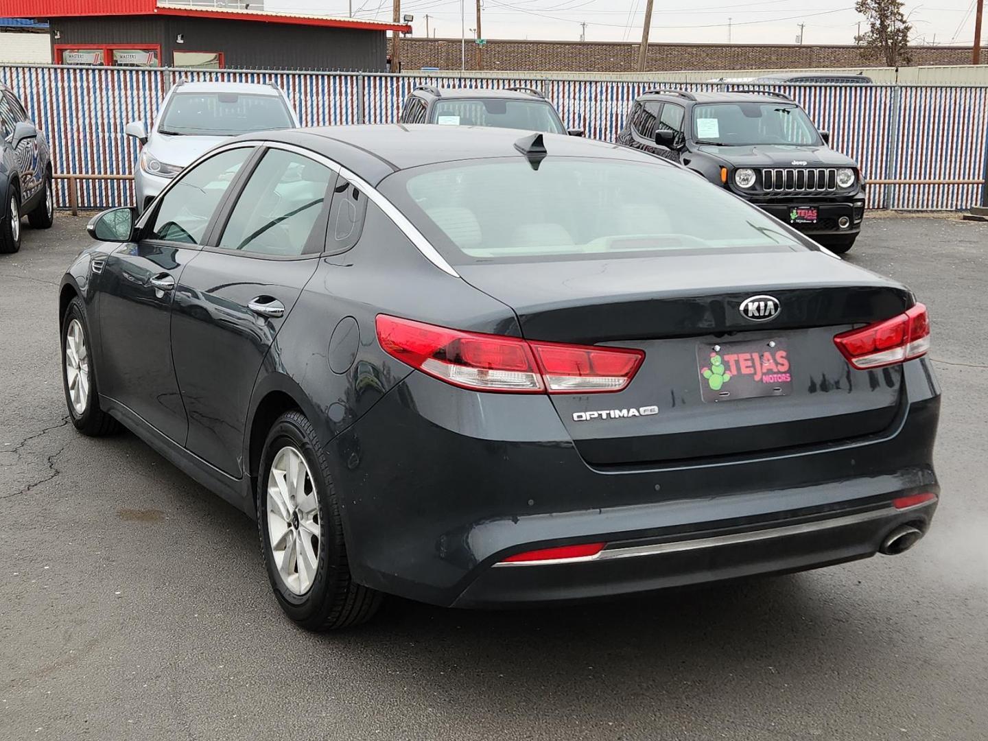 2016 GRAY Kia Optima LX (5XXGT4L3XGG) with an Theta II 2.4L I-4 gasoline direct injection, DOHC, CVVT variable valve control, regular unleaded, engine with 185HP engine, located at 4110 Avenue Q, Lubbock, 79412, 33.556553, -101.855820 - 02/13/2025 KEY IN ENVELOPE GOD - Photo#2