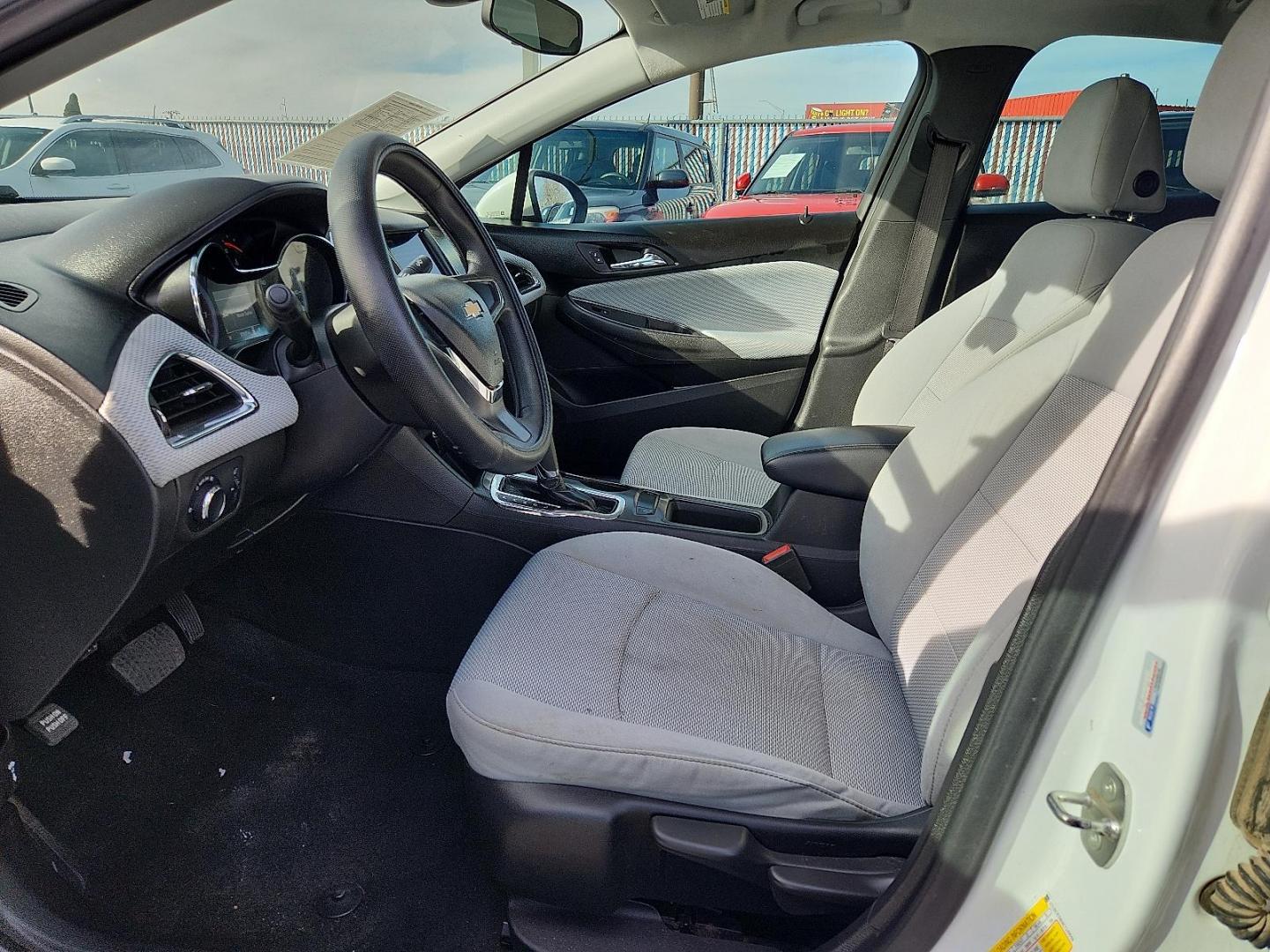2019 WHITE /Grey Chevrolet Cruze LS (1G1BC5SM4K7) with an 1.4L I-4 gasoline direct injection, DOHC, VVT variable valve control, intercooled turbo, regular unleaded, engine with 153HP engine, located at 4110 Avenue Q, Lubbock, 79412, 33.556553, -101.855820 - Photo#6