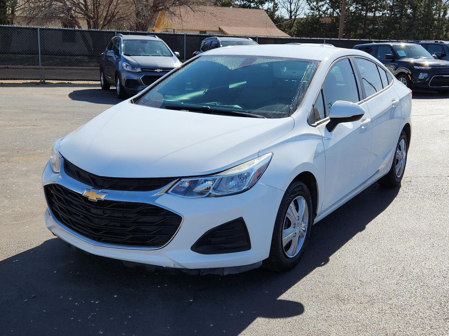 2019 WHITE Chevrolet Cruze LS (1G1BC5SM4K7) with an 1.4L I-4 gasoline direct injection, DOHC, VVT variable valve control, intercooled turbo, regular unleaded, engine with 153HP engine, located at 4110 Avenue Q, Lubbock, 79412, 33.556553, -101.855820 - Photo#3
