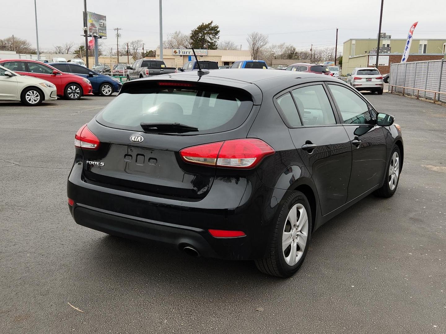 2016 BLACK Kia Forte LX (KNAFK5A81G5) with an 2L I-4 gasoline direct injection, DOHC, D-CVVT variable valve control, regular unleaded, engine with 173HP engine, located at 4110 Avenue Q, Lubbock, 79412, 33.556553, -101.855820 - 03/13/2025 KEY IN ENVELOPE GOD - Photo#1