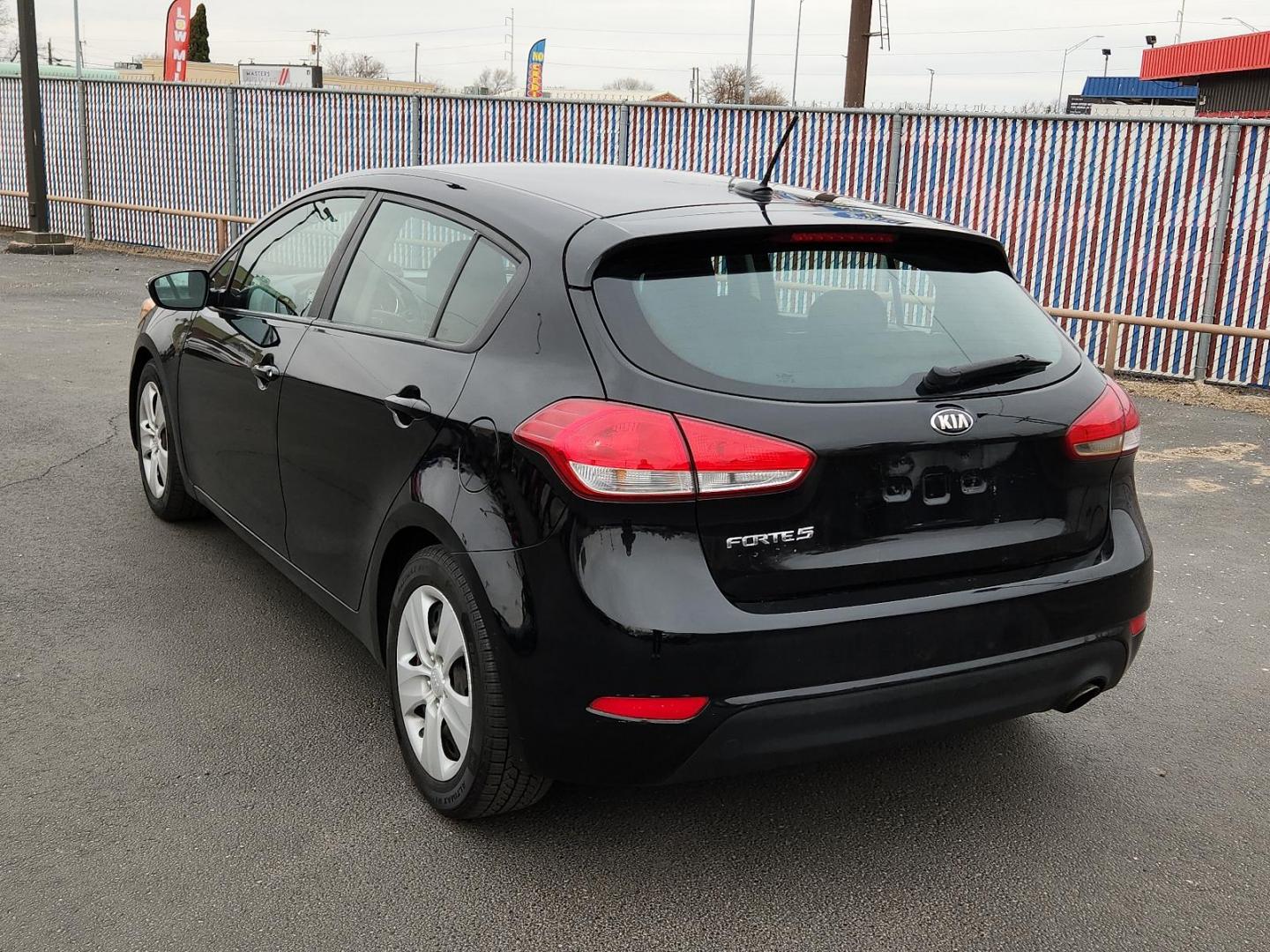 2016 BLACK Kia Forte LX (KNAFK5A81G5) with an 2L I-4 gasoline direct injection, DOHC, D-CVVT variable valve control, regular unleaded, engine with 173HP engine, located at 4110 Avenue Q, Lubbock, 79412, 33.556553, -101.855820 - 03/13/2025 KEY IN ENVELOPE GOD - Photo#2