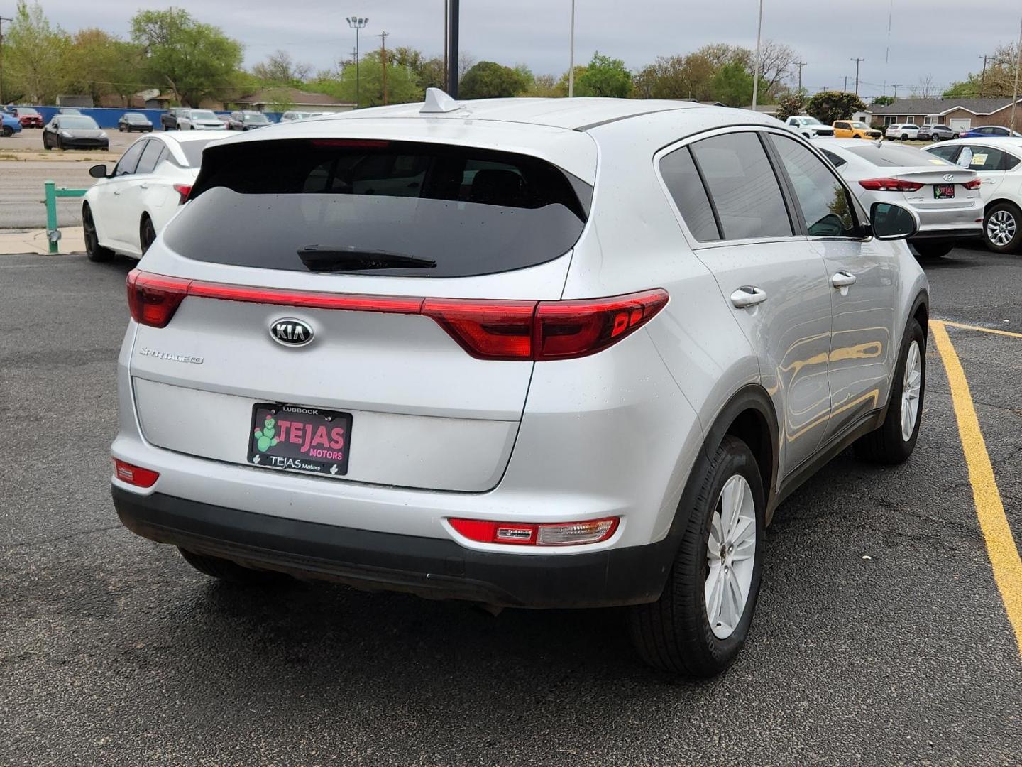 2017 SILVER Kia Sportage LX (KNDPM3AC3H7) with an Theta II 2.4L I-4 gasoline direct injection, DOHC, D-CVVT variable valve control, regular unleaded, engine with 181HP engine, located at 4110 Avenue Q, Lubbock, 79412, 33.556553, -101.855820 - Photo#1