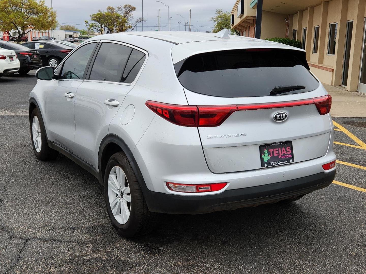 2017 SILVER Kia Sportage LX (KNDPM3AC3H7) with an Theta II 2.4L I-4 gasoline direct injection, DOHC, D-CVVT variable valve control, regular unleaded, engine with 181HP engine, located at 4110 Avenue Q, Lubbock, 79412, 33.556553, -101.855820 - Photo#2