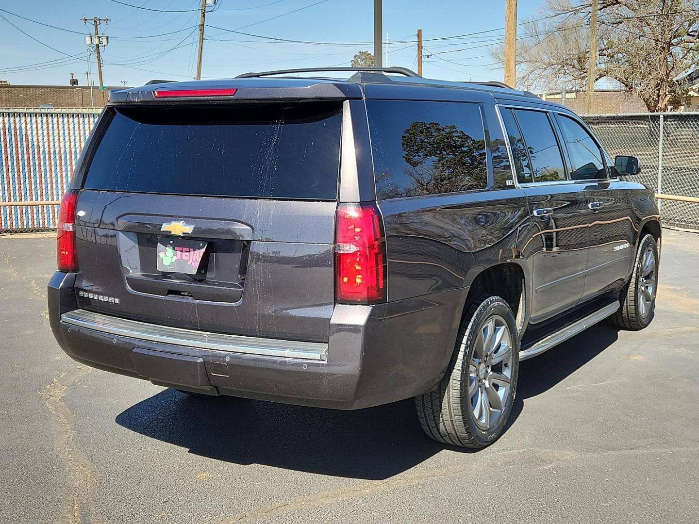2015 GRAY Chevrolet Suburban 1500 LTZ (1GNSCKKC5FR) with an EcoTec3 5.3L V-8 gasoline direct injection, variable valve control, regular unleaded, engine with cylinder deactivation and 355HP engine, located at 4110 Avenue Q, Lubbock, 79412, 33.556553, -101.855820 - Photo#1
