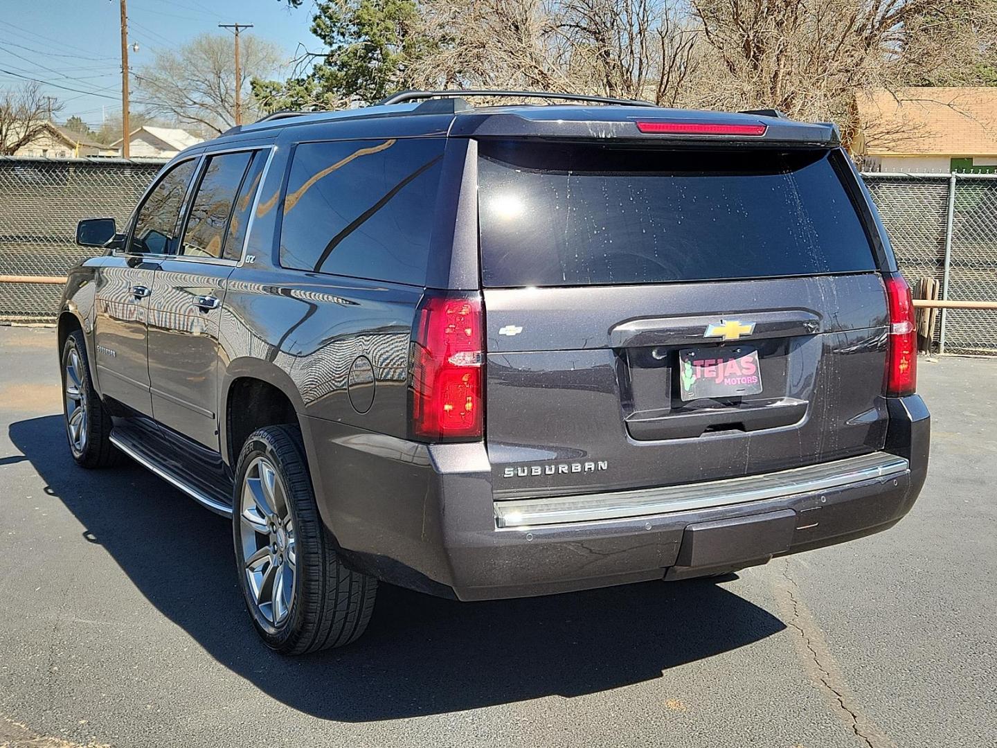 2015 GRAY Chevrolet Suburban 1500 LTZ (1GNSCKKC5FR) with an EcoTec3 5.3L V-8 gasoline direct injection, variable valve control, regular unleaded, engine with cylinder deactivation and 355HP engine, located at 4110 Avenue Q, Lubbock, 79412, 33.556553, -101.855820 - Photo#2