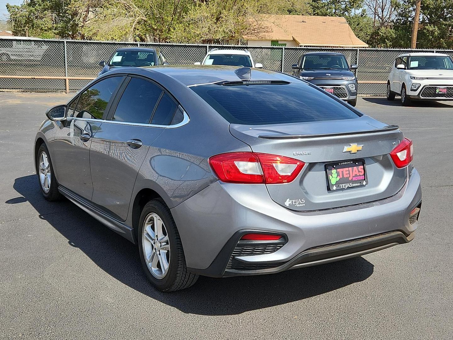 2018 GRAY Chevrolet Cruze LT Auto (1G1BE5SM1J7) with an 1.4L I-4 gasoline direct injection, DOHC, variable valve control, intercooled turbo, regular unleaded, engine with 153HP engine, located at 4110 Avenue Q, Lubbock, 79412, 33.556553, -101.855820 - 03/29/2025 KEY IN ENVELOPE GOD - Photo#2