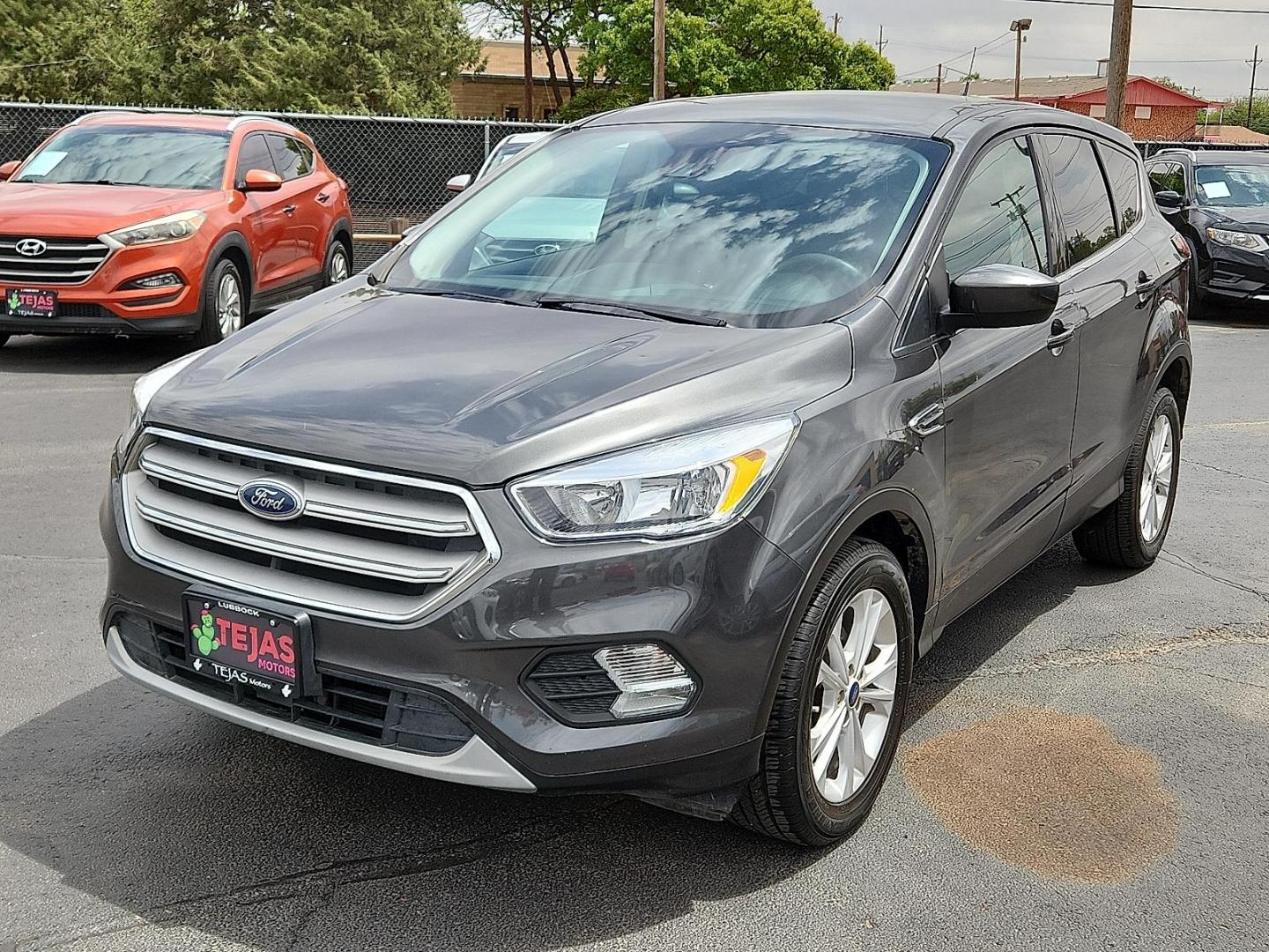2019 GRAY Ford Escape SE (1FMCU0GDXKU) with an EcoBoost 1.5L I-4 gasoline direct injection, DOHC, iVCT variable valve control, intercooled turbo, regular unleaded, engine with 179HP engine, located at 4110 Avenue Q, Lubbock, 79412, 33.556553, -101.855820 - 04/10/2025 KEY IN ENVELOPE GOD - Photo#3