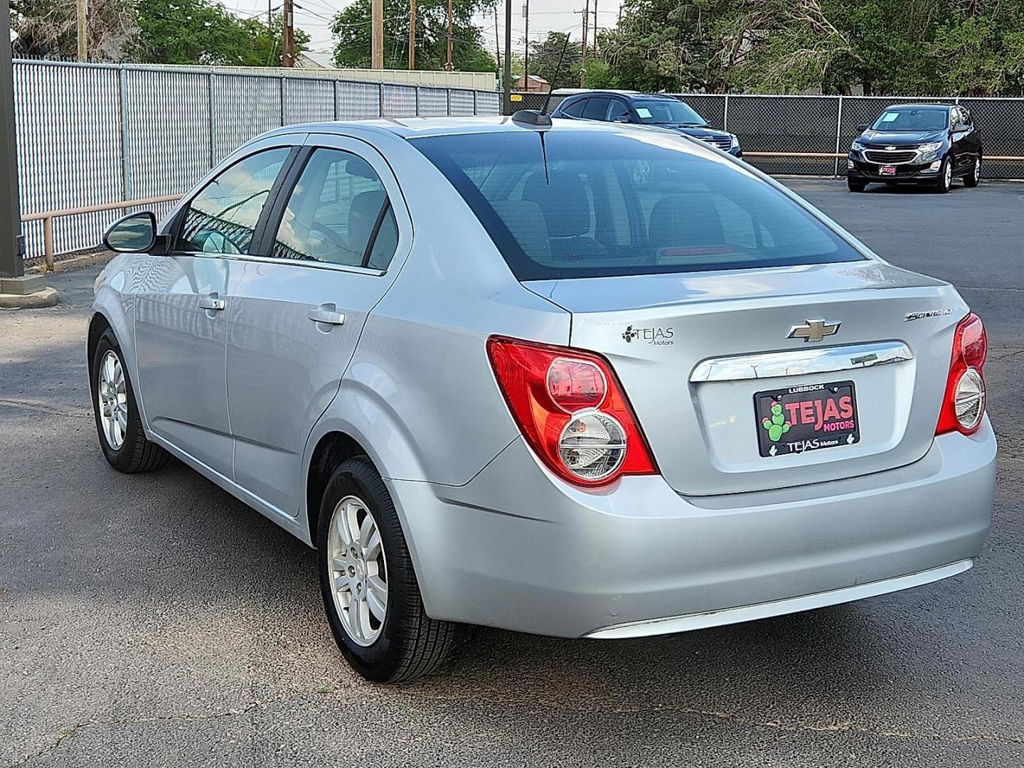 2016 SILVER Chevrolet Sonic LT Auto (1G1JC5SH2G4) with an Ecotec 1.8L I-4 DOHC, variable valve control, regular unleaded, engine with 138HP engine, located at 4110 Avenue Q, Lubbock, 79412, 33.556553, -101.855820 - Photo#2