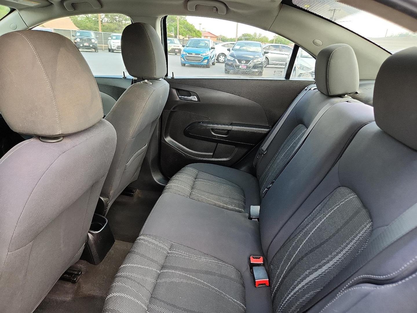 2016 SILVER Chevrolet Sonic LT Auto (1G1JC5SH2G4) with an Ecotec 1.8L I-4 DOHC, variable valve control, regular unleaded, engine with 138HP engine, located at 4110 Avenue Q, Lubbock, 79412, 33.556553, -101.855820 - Photo#4