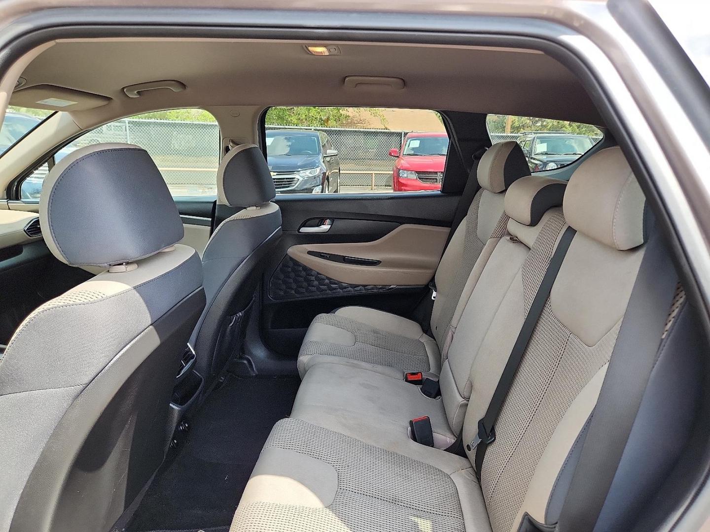 2019 BROWN Hyundai Santa Fe SE (5NMS23AD8KH) with an Theta II 2.4L I-4 gasoline direct injection, DOHC, D-CVVT variable valve control, regular unleaded, engine with 185HP engine, located at 4110 Avenue Q, Lubbock, 79412, 33.556553, -101.855820 - 04/18/2025 KEY IN ENVELOPE GOD - Photo#4