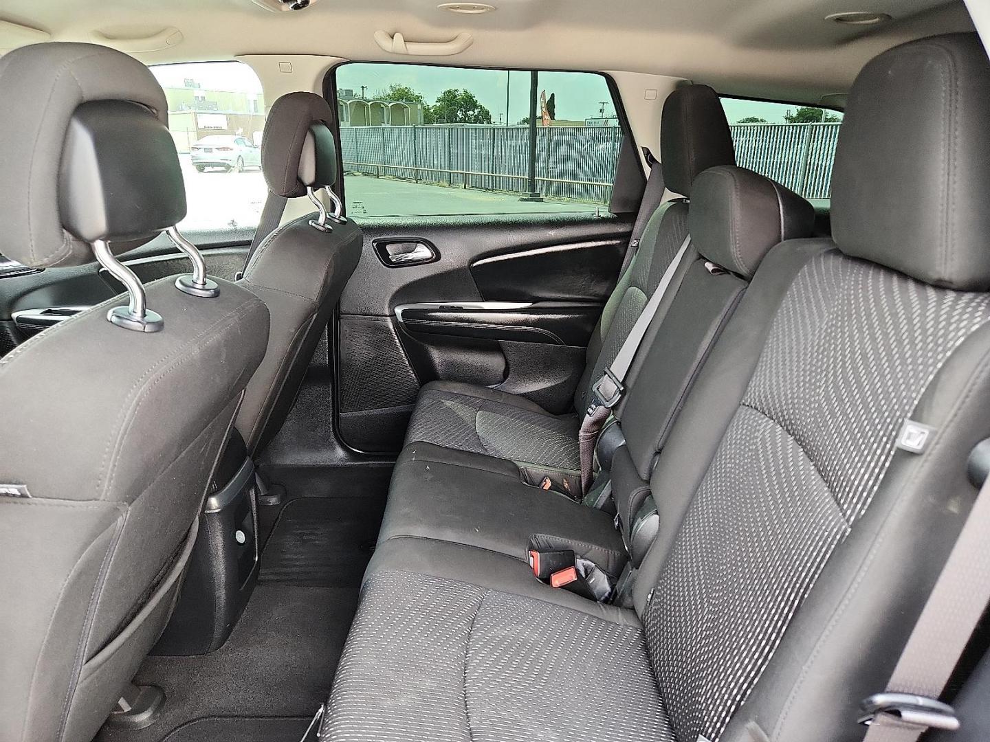 2019 BLACK Dodge Journey SE (3C4PDCBB1KT) with an Tigershark MultiAir 2.4L I-4 DOHC, VVT variable valve control, regular unleaded, engine with 173HP engine, located at 4110 Avenue Q, Lubbock, 79412, 33.556553, -101.855820 - 05/02/2025 KEY IN ENVELOPE GO - Photo#4