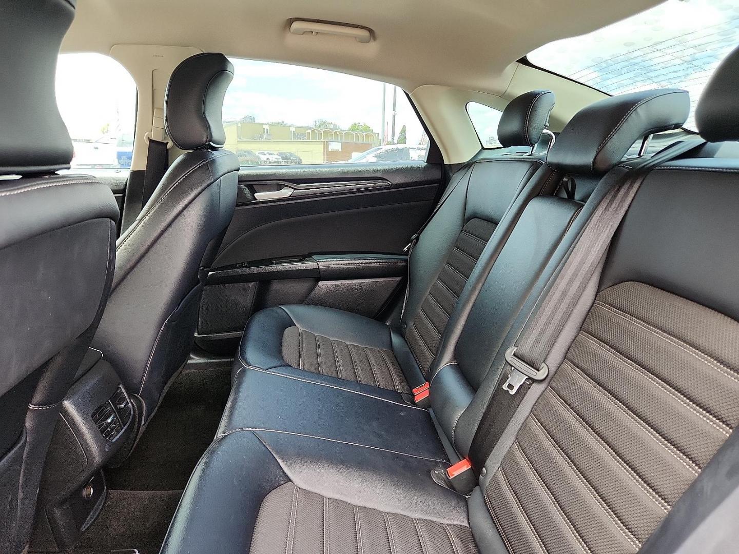 2018 BLUE Ford Fusion SE (3FA6P0HDXJR) with an EcoBoost 1.5L I-4 gasoline direct injection, DOHC, Ti-VCT variable valve control, intercooled turbo, regular unleaded, engine with 181HP engine, located at 4110 Avenue Q, Lubbock, 79412, 33.556553, -101.855820 - 04/29/2025 KEY IN ENVELOPE GOD - Photo#4