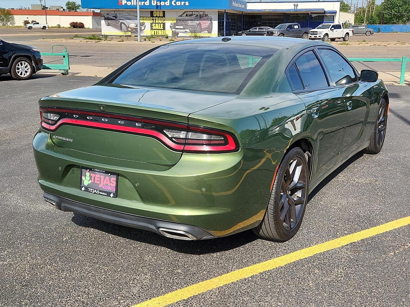 2020 F8 Green Dodge Charger SXT RWD (2C3CDXBG8LH) with an Pentastar 3.6L V-6 DOHC, variable valve control, regular unleaded, engine with 292HP engine, located at 4110 Avenue Q, Lubbock, 79412, 33.556553, -101.855820 - 04/29/2025 KEY IN ENVELOPE GOD - Photo#1
