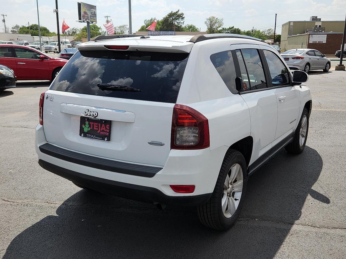 2014 WHITE Jeep Compass Latitude (1C4NJCEB5ED) with an 2.4L I-4 DOHC, variable valve control, regular unleaded, engine with 172HP engine, located at 4110 Avenue Q, Lubbock, 79412, 33.556553, -101.855820 - 05/02/2025 KEY IN ENVELOPE GOD - Photo#1